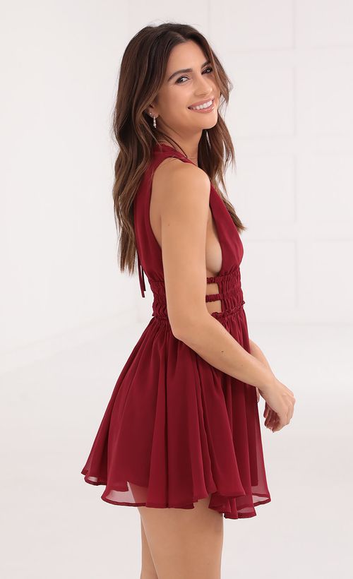 Picture Babette Plunge A-Line Dress in Burgundy. Source: https://media.lucyinthesky.com/data/Oct21_1/500xAUTO/1V9A0927.JPG