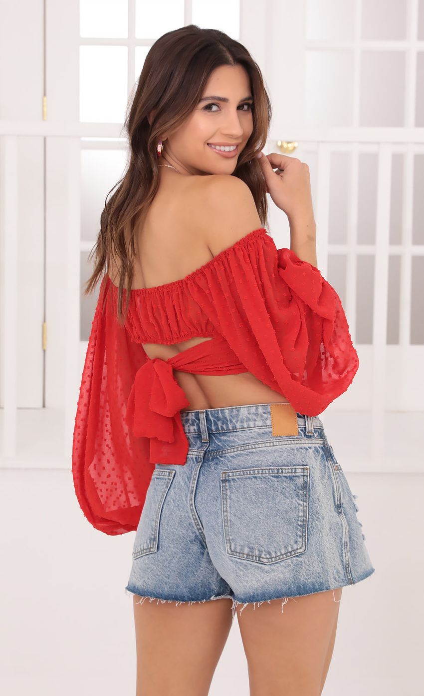 Picture Sadie Top in Red Polka Dot. Source: https://media.lucyinthesky.com/data/Oct21_1/850xAUTO/1V9A0068.JPG