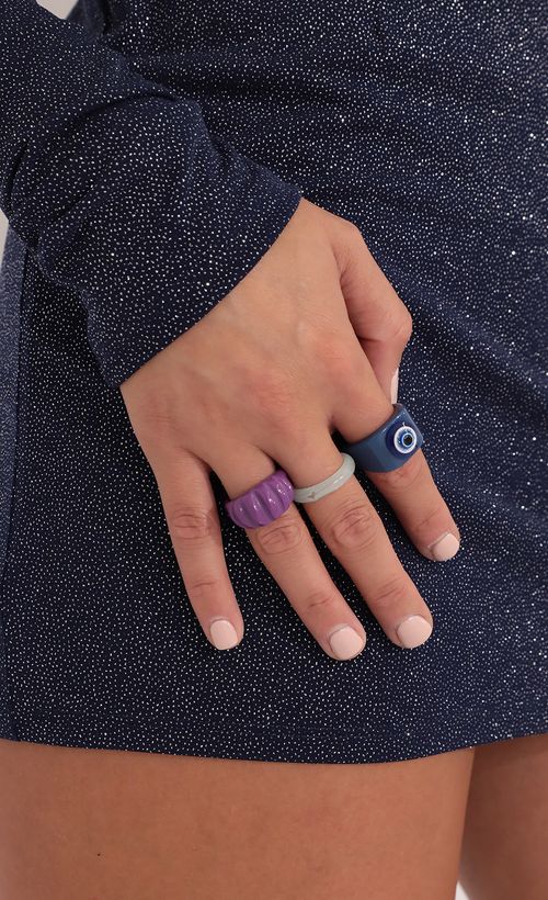 Picture Blue Eyed Baby Resin Ring Set in Blue and Purple. Source: https://media.lucyinthesky.com/data/Oct21_2/500xAUTO/1V9A8065.JPG