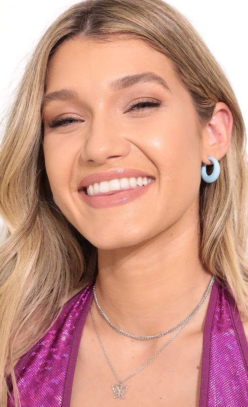 Picture Puff Princess Open Hoop Earring in Blue. Source: https://media.lucyinthesky.com/data/Oct21_2/500xAUTO/1V9A8550.JPG