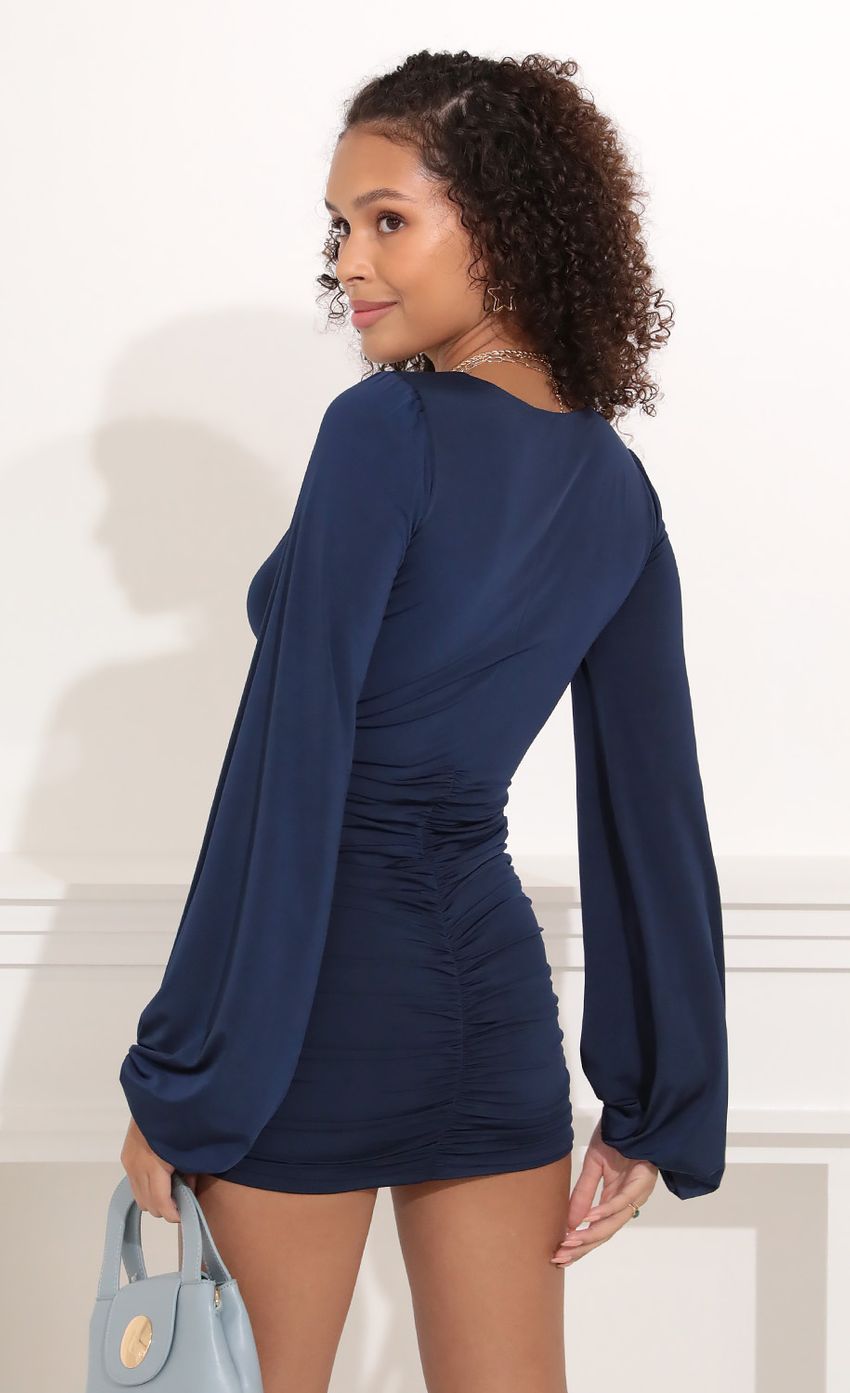 Picture Bridgette Long Sleeve Ruched dress in Navy Blue. Source: https://media.lucyinthesky.com/data/Oct21_2/850xAUTO/1V9A3330.JPG