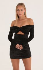 Picture Meztli Velvet Glitter Off The Shoulder Dress in Black. Source: https://media.lucyinthesky.com/data/Oct22/150xAUTO/40642330-ce97-4e32-a05b-b1124b0635f8.jpeg