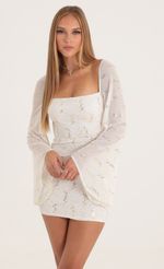 Picture Korra Mesh Sequin Flare Sleeve Dress in White. Source: https://media.lucyinthesky.com/data/Oct22/150xAUTO/bc8d0169-787c-4ee2-9dbc-840ecfd152d0.jpg