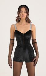 Picture Rada Silver Sequin Hook and Eye Romper in Black. Source: https://media.lucyinthesky.com/data/Oct22/150xAUTO/f66d5ffd-8bcf-4111-a2b0-286a39ce7b16.jpg