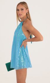 Picture thumb Tallulah Iridescent Sequin Open Back Dress in Blue. Source: https://media.lucyinthesky.com/data/Oct22/170xAUTO/1be36637-4c7e-45f6-bfe0-dfc79f6b31c6.jpg