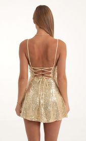 Picture thumb Jewel Sequin Cowl Neck Dress in Gold. Source: https://media.lucyinthesky.com/data/Oct22/170xAUTO/23ee1782-d611-44a9-bd64-0acb455d5139.jpg