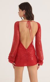 Picture thumb Kirsten Sequin Open Back Long Sleeve Dress in Red. Source: https://media.lucyinthesky.com/data/Oct22/170xAUTO/259024cb-7e8d-4991-b3cd-f8e3a45f3ebe.jpg