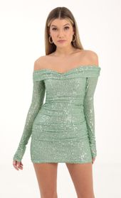 Picture thumb Olinda Sequin Mesh Off The Shoulder Dress in Green. Source: https://media.lucyinthesky.com/data/Oct22/170xAUTO/399950f7-93db-4fb4-afe7-3336dd1c597c.jpg