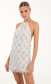 Picture thumb Vesper Fringe Sequin Halter Dress in White. Source: https://media.lucyinthesky.com/data/Oct22/170xAUTO/518eed3b-39da-4c95-b9c0-ef826cddc70c.jpg