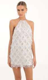 Picture thumb Vesper Fringe Sequin Halter Dress in White. Source: https://media.lucyinthesky.com/data/Oct22/170xAUTO/59ea3896-661a-41fd-8337-203e6413659f.jpg