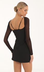 Picture thumb Rania Rhinestone Mesh Cutout Dress in Black. Source: https://media.lucyinthesky.com/data/Oct22/170xAUTO/6f55ac0a-9b2f-430c-bbec-74e0565ec588.jpg