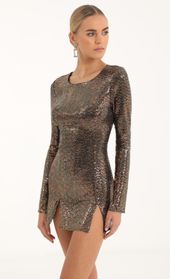 Picture thumb Claudette Iridescent Sequin Cinched Bodycon Dress in Copper. Source: https://media.lucyinthesky.com/data/Oct22/170xAUTO/73503ca5-f380-47a3-a3ca-9edaadc6339c.jpg