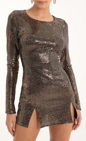 Picture thumb Claudette Iridescent Sequin Cinched Bodycon Dress in Copper. Source: https://media.lucyinthesky.com/data/Oct22/170xAUTO/7d136028-28d0-4d63-8992-54296632df26.jpg
