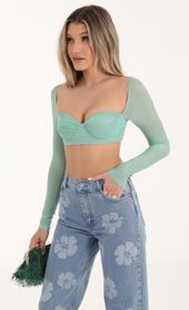 Picture thumb Cleopatra Glitter Mesh Long Sleeve Crop Top in Green. Source: https://media.lucyinthesky.com/data/Oct22/170xAUTO/99ab678e-4952-4d21-9d09-b385f3ee8a10.jpg