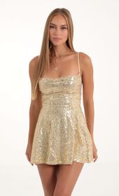 Picture thumb Jewel Sequin Cowl Neck Dress in Gold. Source: https://media.lucyinthesky.com/data/Oct22/170xAUTO/9fb29bd1-9711-4b45-8393-ce1f1431f999.jpg