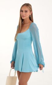 Picture thumb Mehi Glitter Mesh Puff Sleeve Dress in Blue. Source: https://media.lucyinthesky.com/data/Oct22/170xAUTO/ceb05311-dc34-4214-aa1e-1ebe059f0f52.jpg