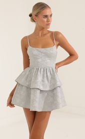 Picture thumb Suzanne Floral Jacquard Ruffle Dress in Grey. Source: https://media.lucyinthesky.com/data/Oct22/170xAUTO/e88ec388-44df-40c6-bb1d-5fcbb951bd26.jpg