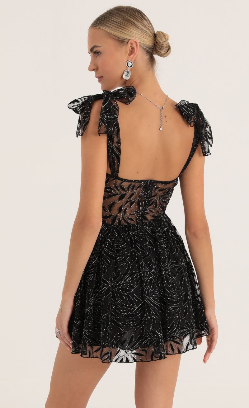 Picture Jacqueline Glitter Mesh Print Dress in Black. Source: https://media.lucyinthesky.com/data/Oct22/800xAUTO/334fd79a-9d21-45e2-9c4a-51c1623e34de.jpg