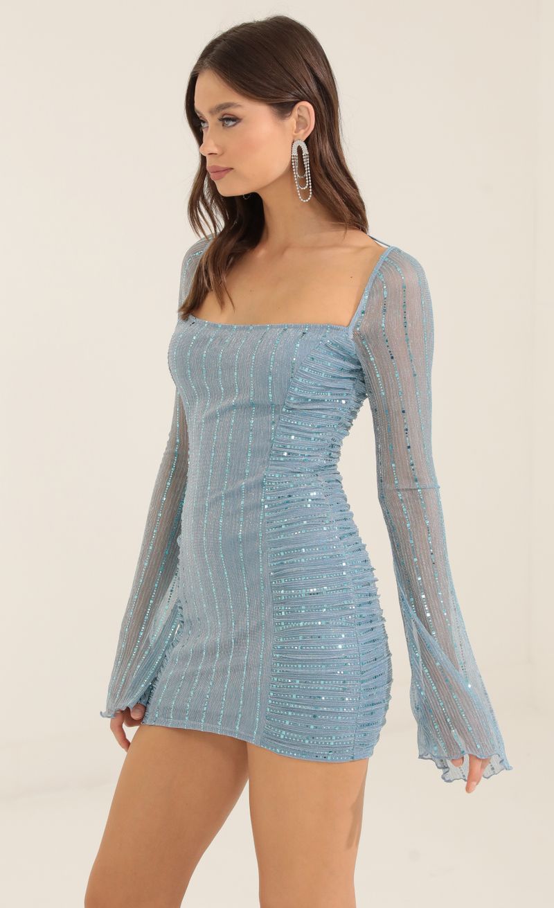 Picture Sarai Metallic Sequin Ruched Bodycon Dress in Blue. Source: https://media.lucyinthesky.com/data/Oct22/800xAUTO/33739c60-eae9-4a17-af98-a4eda4defc49.jpg