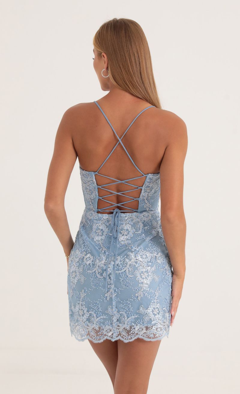 Picture Jody Sequin Floral Embroidered Tulle Dress in Blue. Source: https://media.lucyinthesky.com/data/Oct22/800xAUTO/63b5fb78-8e09-4f75-abb8-2d049bdb0bb4.jpg