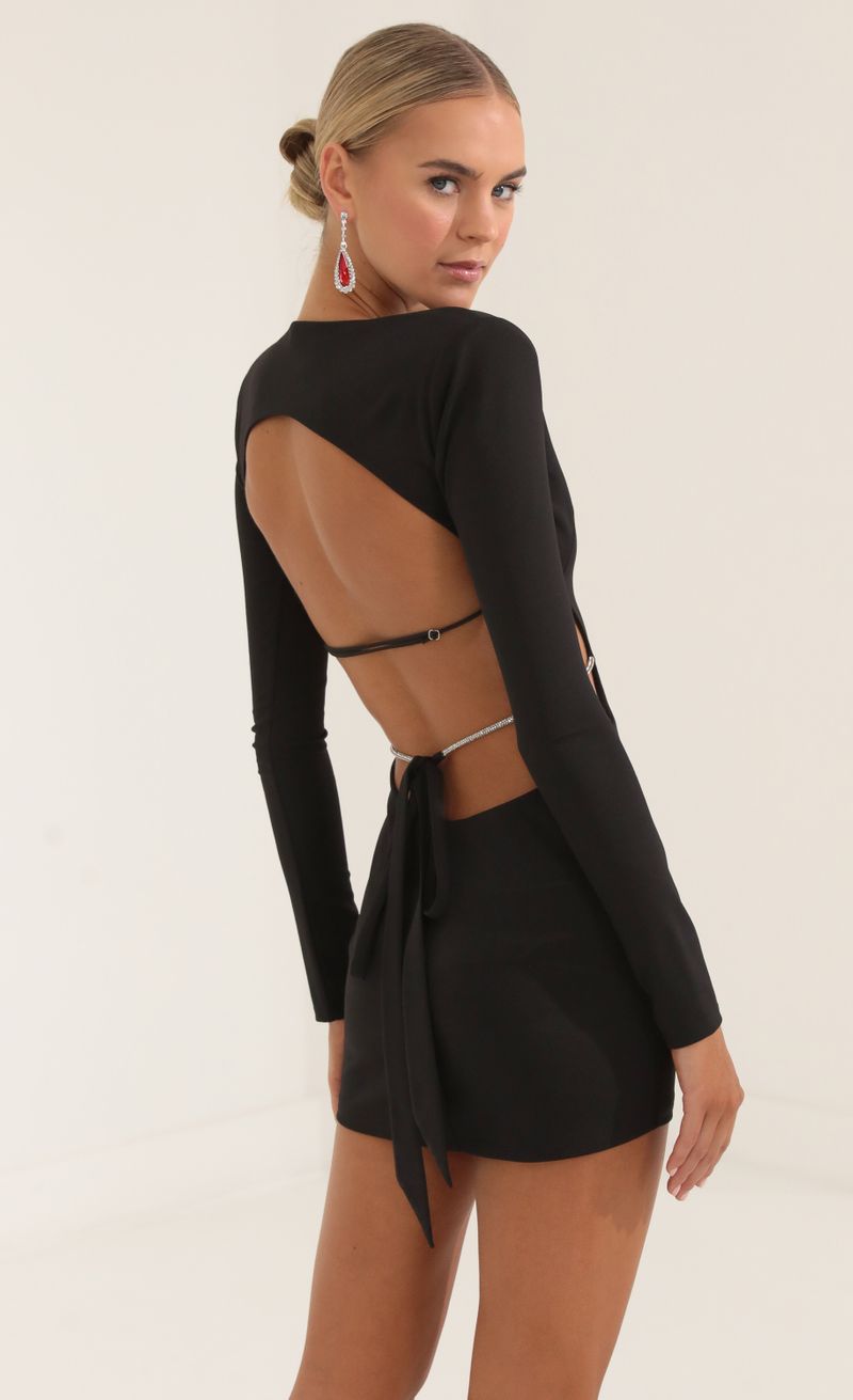 Picture Beatrix Crepe Shoulder Pad Cutout Dress in Black. Source: https://media.lucyinthesky.com/data/Oct22/800xAUTO/6c057de2-7da5-424b-8ed2-eebb0b59607d.jpg