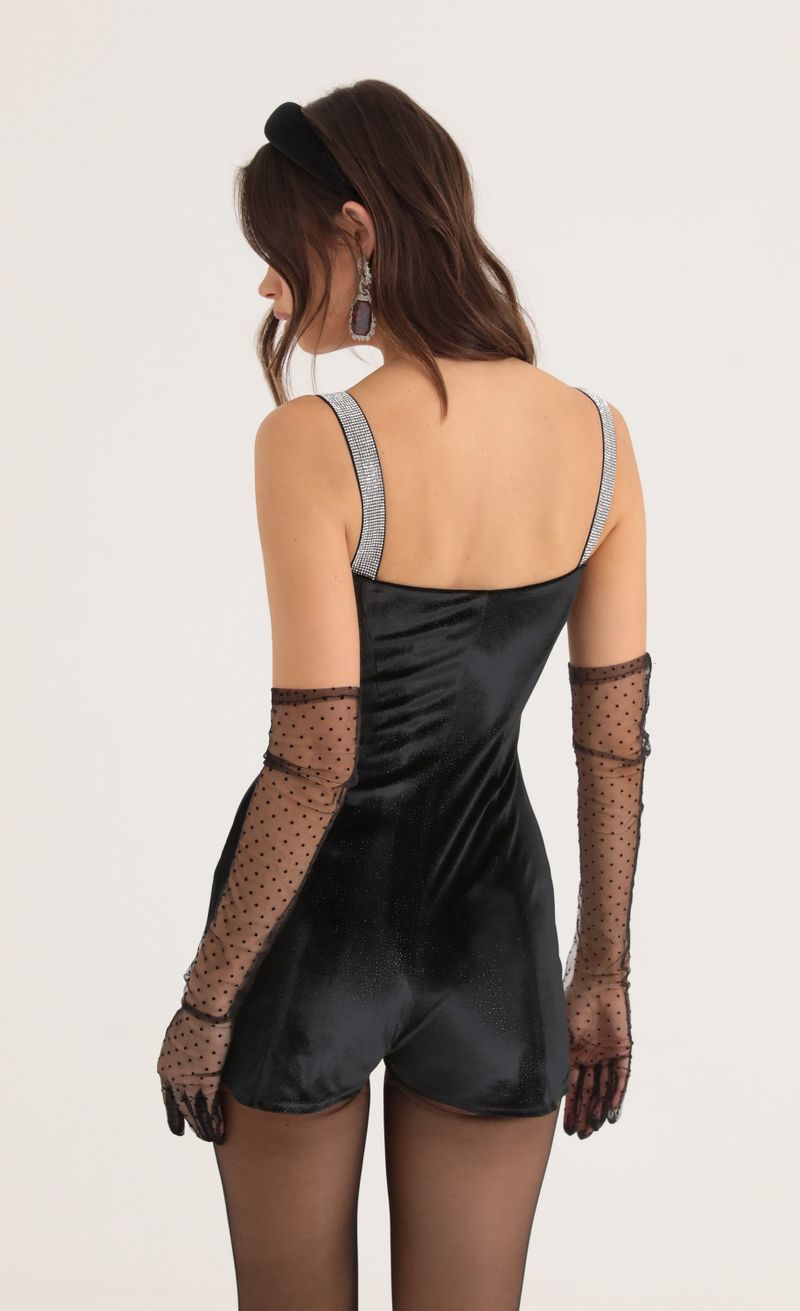 Picture Rada Velvet Shimmer Hook and Eye Romper in Black. Source: https://media.lucyinthesky.com/data/Oct22/800xAUTO/6fae2a6d-a94d-4ce7-acb8-9931ce22d4f0.jpg