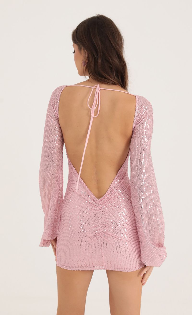 Picture Kirsten Sequin Open Back Long Sleeve Dress in Pink. Source: https://media.lucyinthesky.com/data/Oct22/800xAUTO/7ed0e0dd-8871-4050-9c66-6a51e67f3f40.jpg