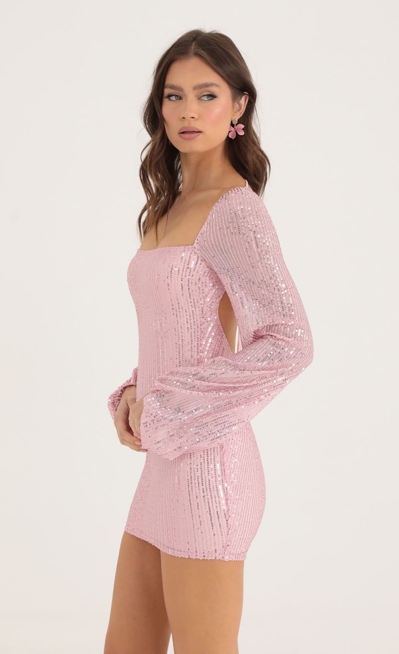 Picture Kirsten Sequin Open Back Long Sleeve Dress in Pink. Source: https://media.lucyinthesky.com/data/Oct22/800xAUTO/9bb35b28-cc48-46f4-a40b-9155ea6d4d55.jpg