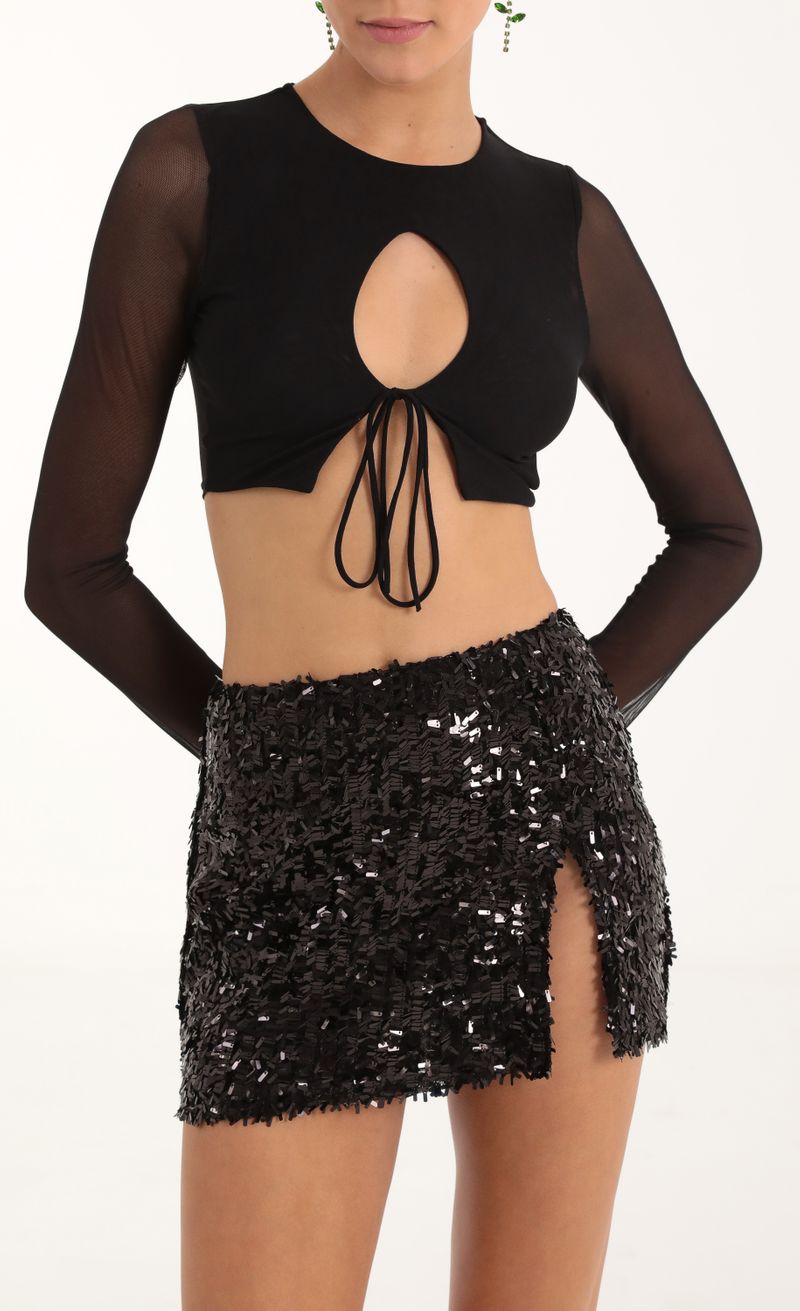 Picture Lilla Sequin Mesh Mini Skirt in Black. Source: https://media.lucyinthesky.com/data/Oct22/800xAUTO/b2d7a3d4-628d-45b0-8df2-1b691ff1a580.jpg