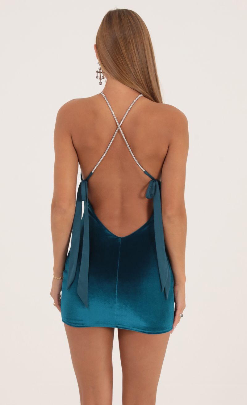 Picture Cher Velvet Halter Dress in Turquoise. Source: https://media.lucyinthesky.com/data/Oct22/800xAUTO/cc12fae2-7b0f-416a-89d6-8b735947bb1a.jpg