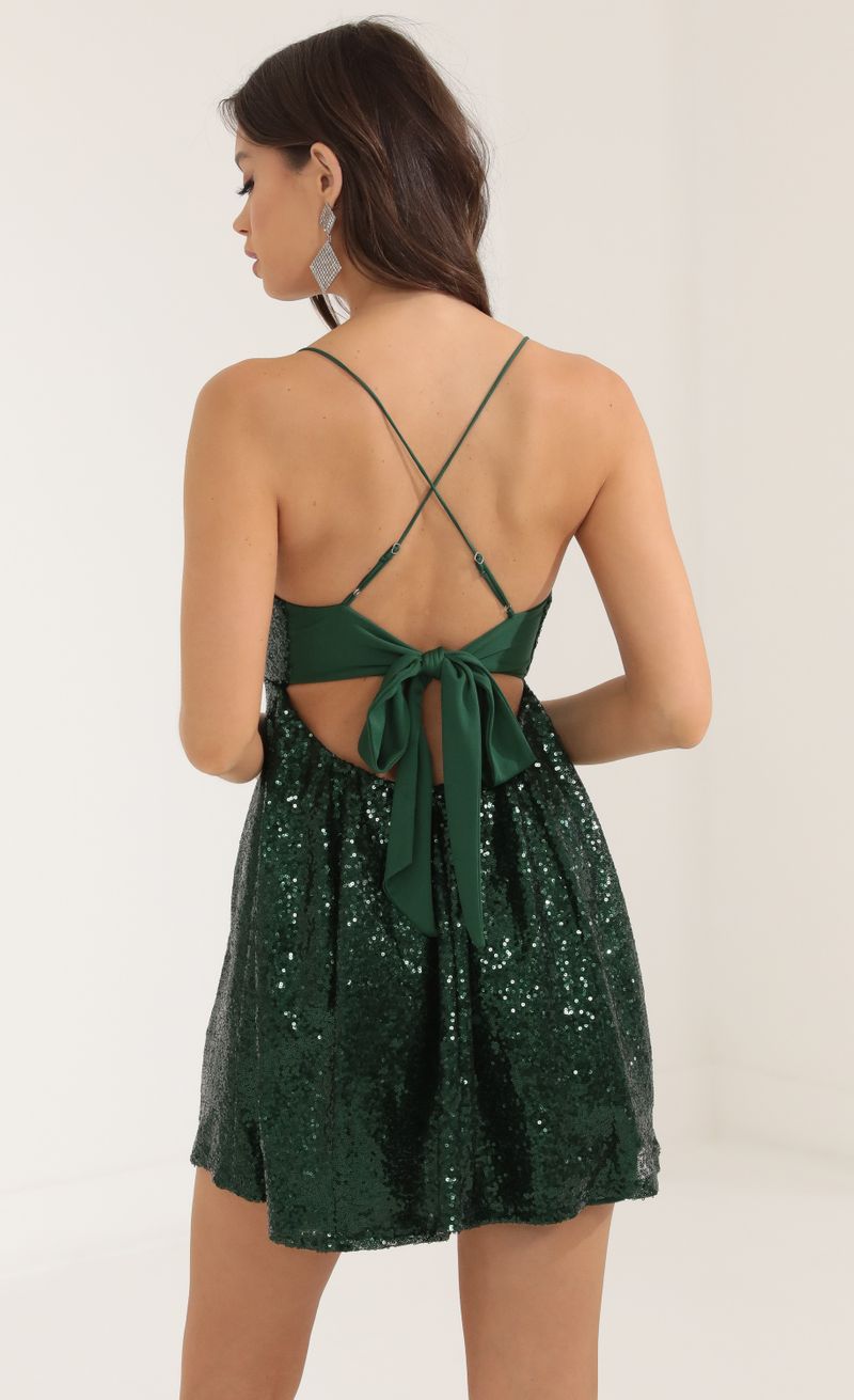 Picture Nicki Sequin A-Line Dress in Green. Source: https://media.lucyinthesky.com/data/Oct22/800xAUTO/dc7e7758-bded-4e0e-8772-10cf902e4d9d.jpg