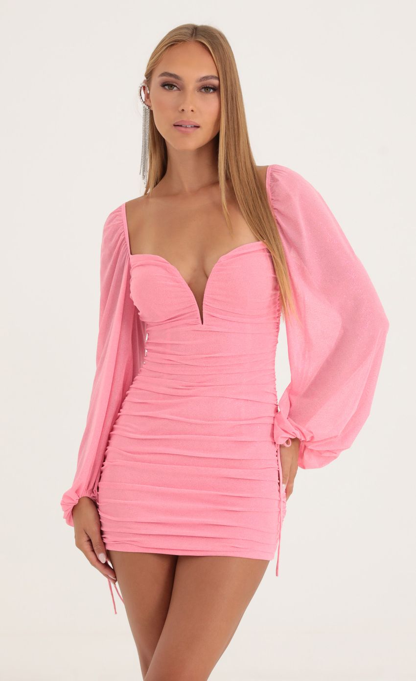 Picture Robin Glitter Deep V Shimmer Dress in Pink. Source: https://media.lucyinthesky.com/data/Oct22/850xAUTO/225e3e67-18eb-4e60-b2ee-409456372165.jpg