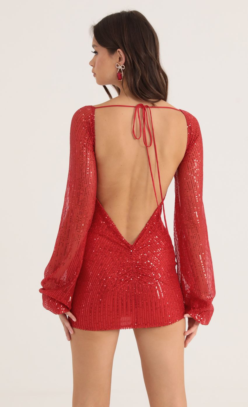 Picture Kirsten Sequin Open Back Long Sleeve Dress in Red. Source: https://media.lucyinthesky.com/data/Oct22/850xAUTO/259024cb-7e8d-4991-b3cd-f8e3a45f3ebe.jpg