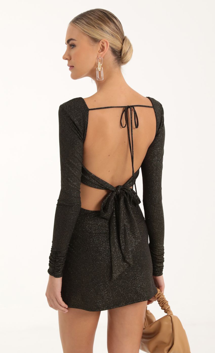 Picture Dawson Glitter Long Sleeve Side Slit Dress in Black. Source: https://media.lucyinthesky.com/data/Oct22/850xAUTO/35cae4e5-494b-44c1-9adc-20579ca3a669.jpg