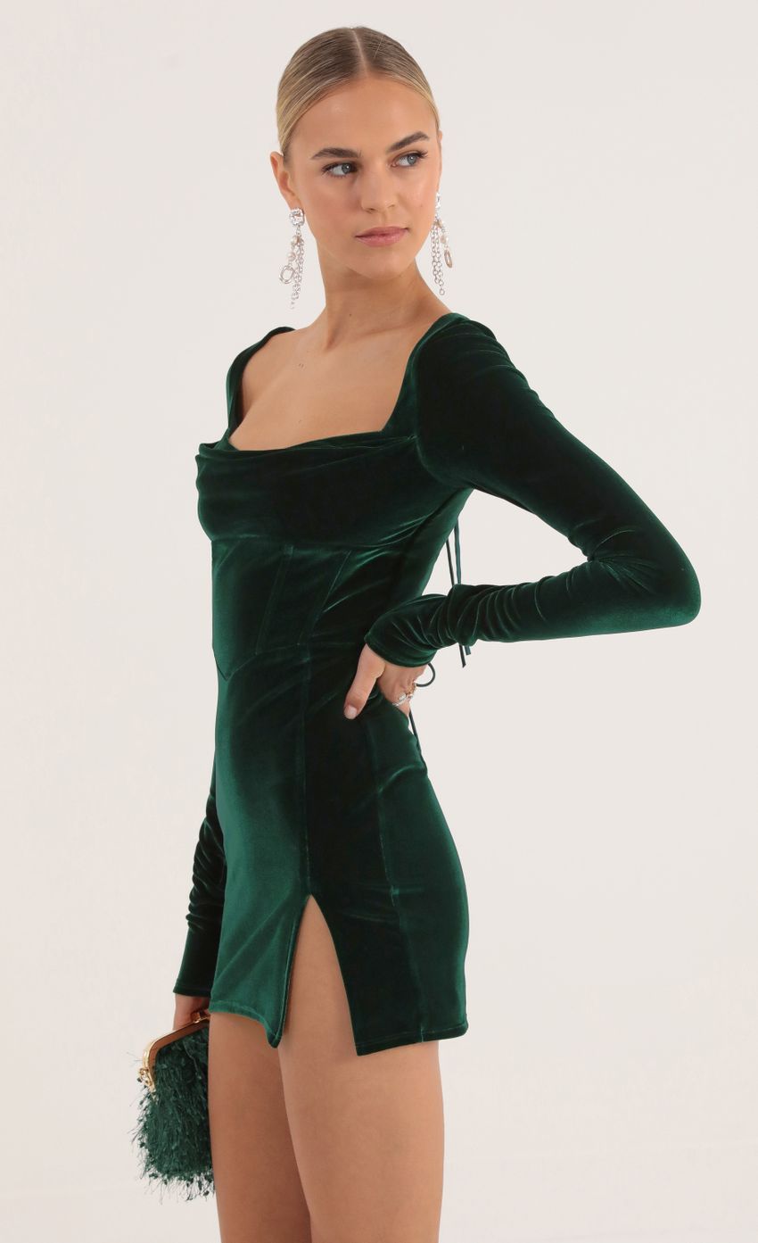 Picture Kaya Velvet Long Sleeve Corset Dress in Green. Source: https://media.lucyinthesky.com/data/Oct22/850xAUTO/5793d728-e780-4b0d-9205-9d6a130b49b3.jpg