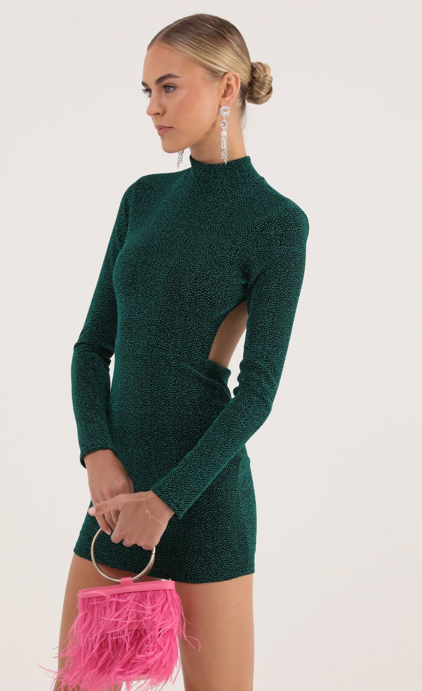 Picture Agnes Dotted Knit Open Back Dress in Green. Source: https://media.lucyinthesky.com/data/Oct22/850xAUTO/618ff29f-6429-40a5-8747-47c9a7a308a9.jpg