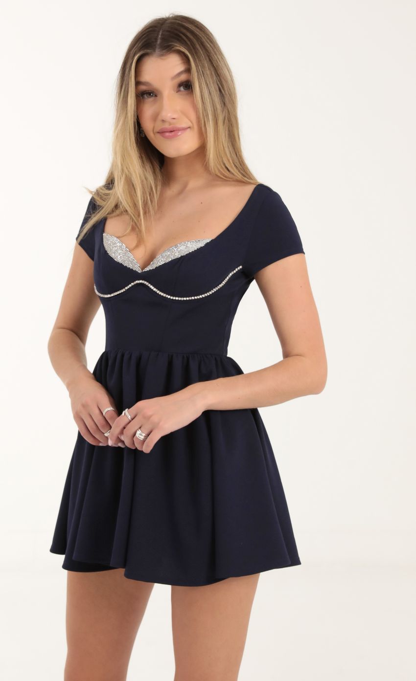 Picture Viera Rhinestone A-Line Dress in Navy Blue. Source: https://media.lucyinthesky.com/data/Oct22/850xAUTO/6a686db3-af72-4ddd-9777-b7709c53eebe.jpg