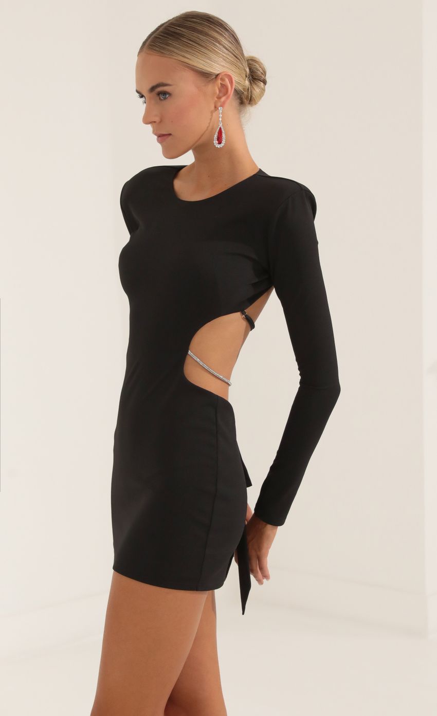 Picture Beatrix Crepe Shoulder Pad Cutout Dress in Black. Source: https://media.lucyinthesky.com/data/Oct22/850xAUTO/85cfc180-2c87-4cc6-8820-270396037cd2.jpg