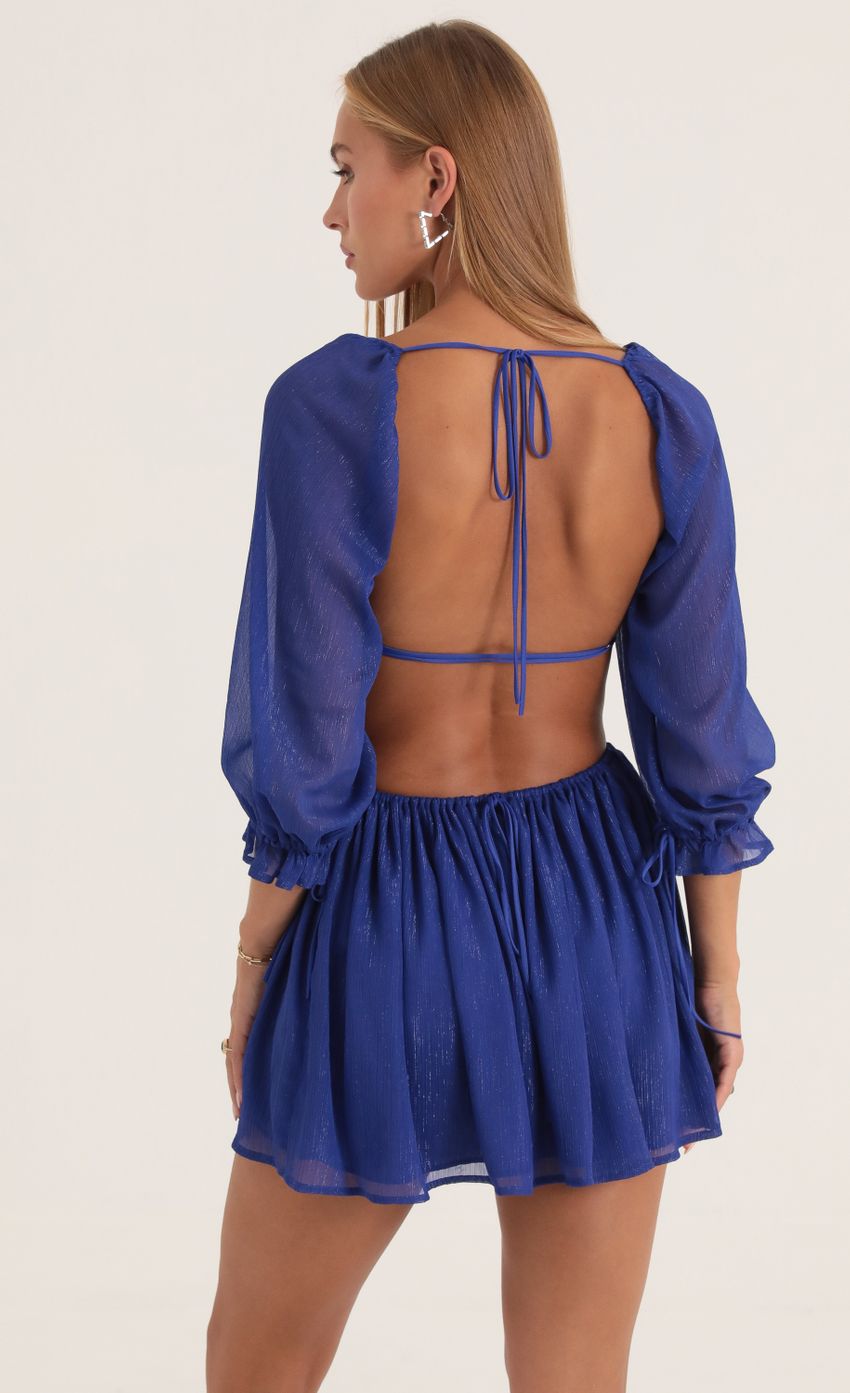Picture Tora Shimmer Chiffon Open Back Dress in Blue. Source: https://media.lucyinthesky.com/data/Oct22/850xAUTO/96e0ed1c-e4c7-47e0-aecc-41ab9450c5b4.jpg