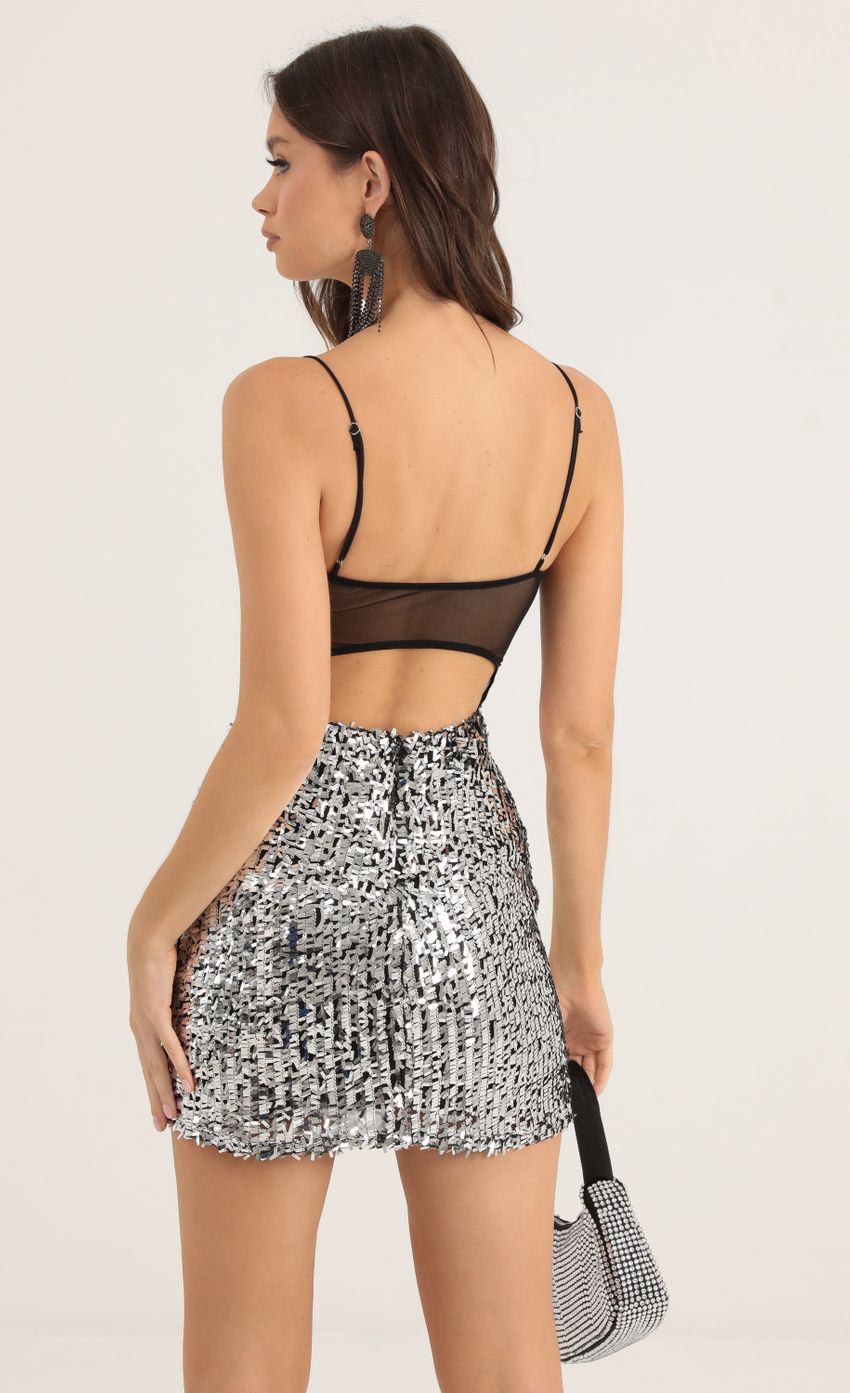 Picture Talisa Mesh Sequin Open Back Bodycon Dress in Silver. Source: https://media.lucyinthesky.com/data/Oct22/850xAUTO/9f0a20de-b3ed-430c-878d-588be98dd720.jpg