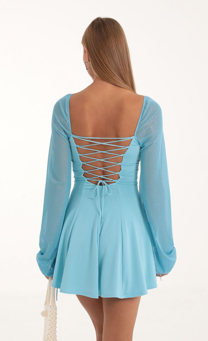 Picture Mehi Glitter Mesh Puff Sleeve Dress in Blue. Source: https://media.lucyinthesky.com/data/Oct22/850xAUTO/b07696cd-f384-4d05-978b-54d2596d6975.jpg
