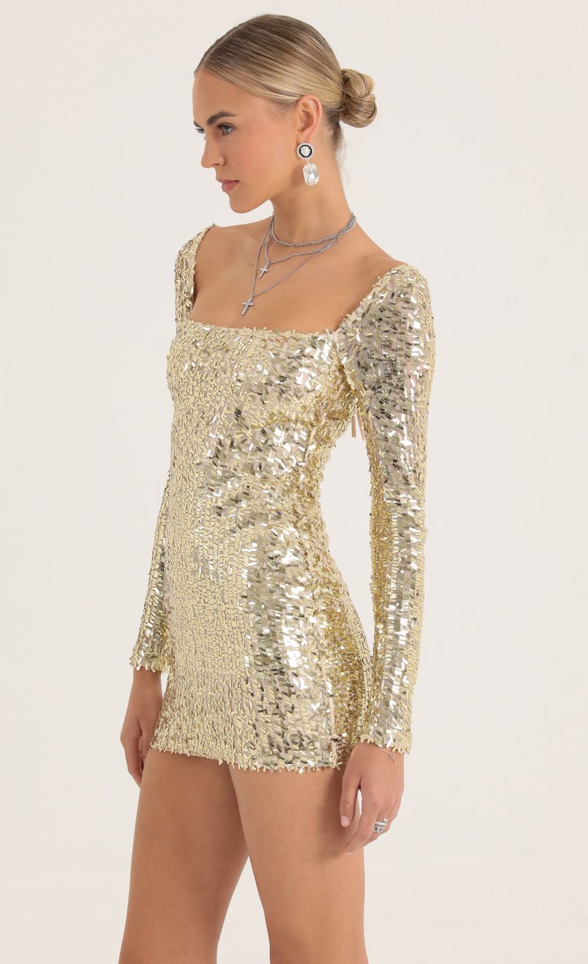 Picture Giulia Sequin Mesh Dress in Gold. Source: https://media.lucyinthesky.com/data/Oct22/850xAUTO/d9841231-6850-4368-a84b-3afa5f7140a2.jpg