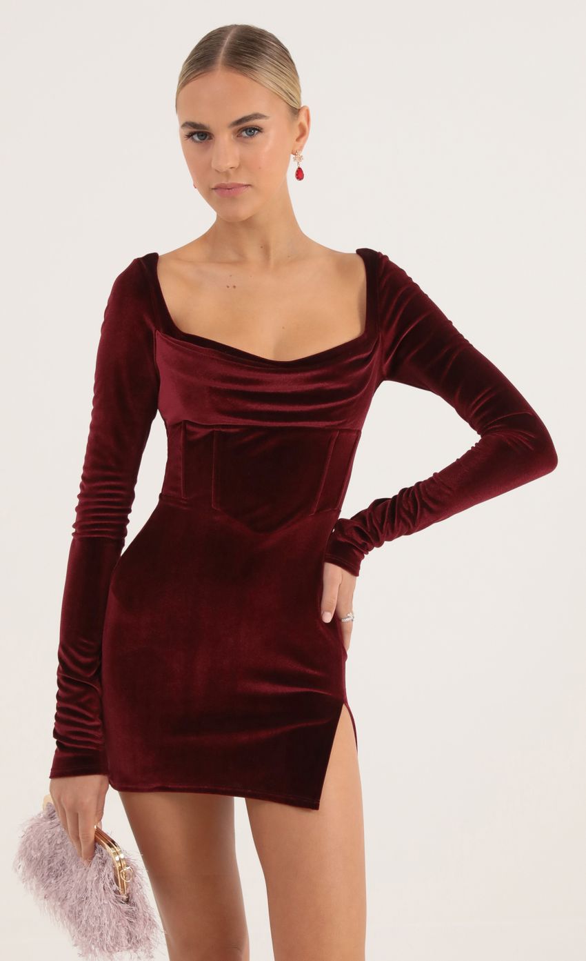Picture Kaya Velvet Long Sleeve Corset Dress in Red. Source: https://media.lucyinthesky.com/data/Oct22/850xAUTO/e22c48d2-12bd-47d7-90b4-e2e8e7ee9a17.jpg