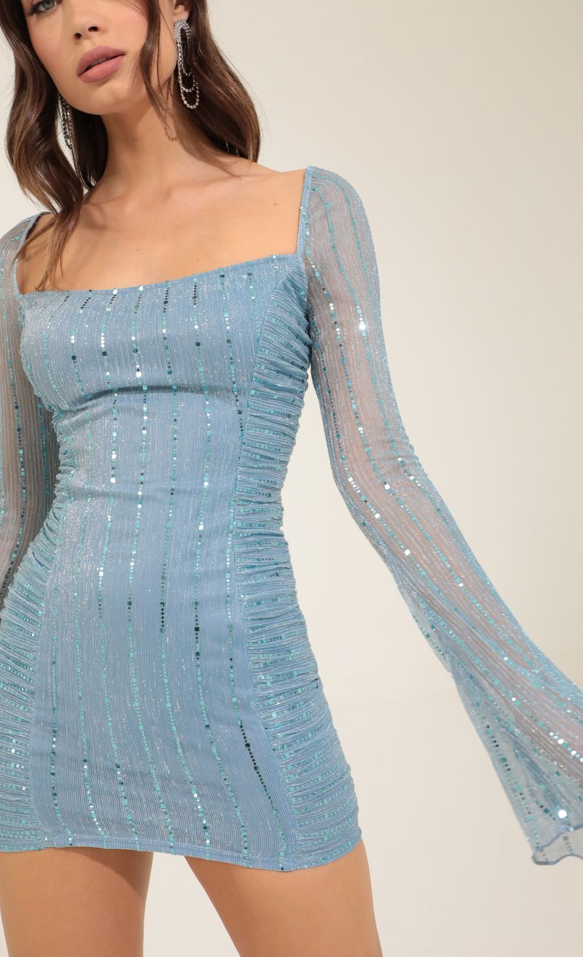 Picture Sarai Metallic Sequin Ruched Bodycon Dress in Blue. Source: https://media.lucyinthesky.com/data/Oct22/850xAUTO/e5d97d24-9c5a-4118-bbbd-fbe71bb75a40.jpg