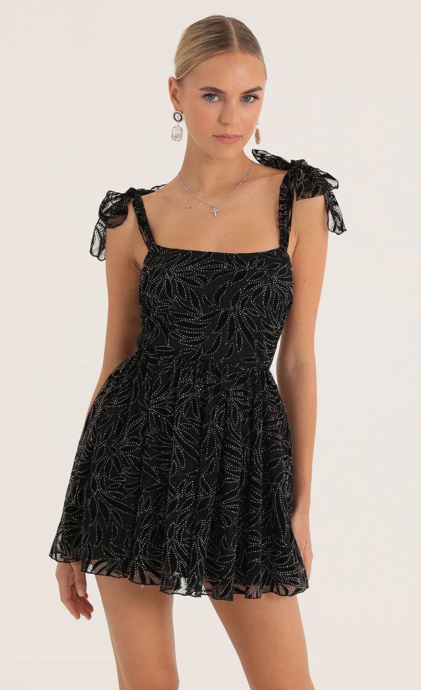 Picture Jacqueline Glitter Mesh Print Dress in Black. Source: https://media.lucyinthesky.com/data/Oct22/850xAUTO/f322918e-87f2-4048-a7a0-d2e9d1bee110.jpg