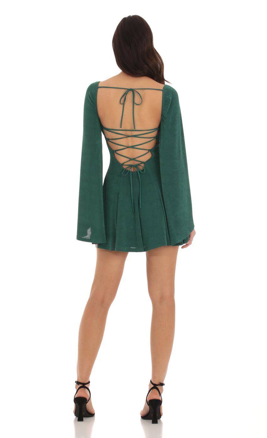Picture Sirena Slinky Flare Sleeve Dress in Green. Source: https://media.lucyinthesky.com/data/Oct23/850xAUTO/1cf98727-b5b2-4ec7-b8f6-f4b40df7b736.jpg