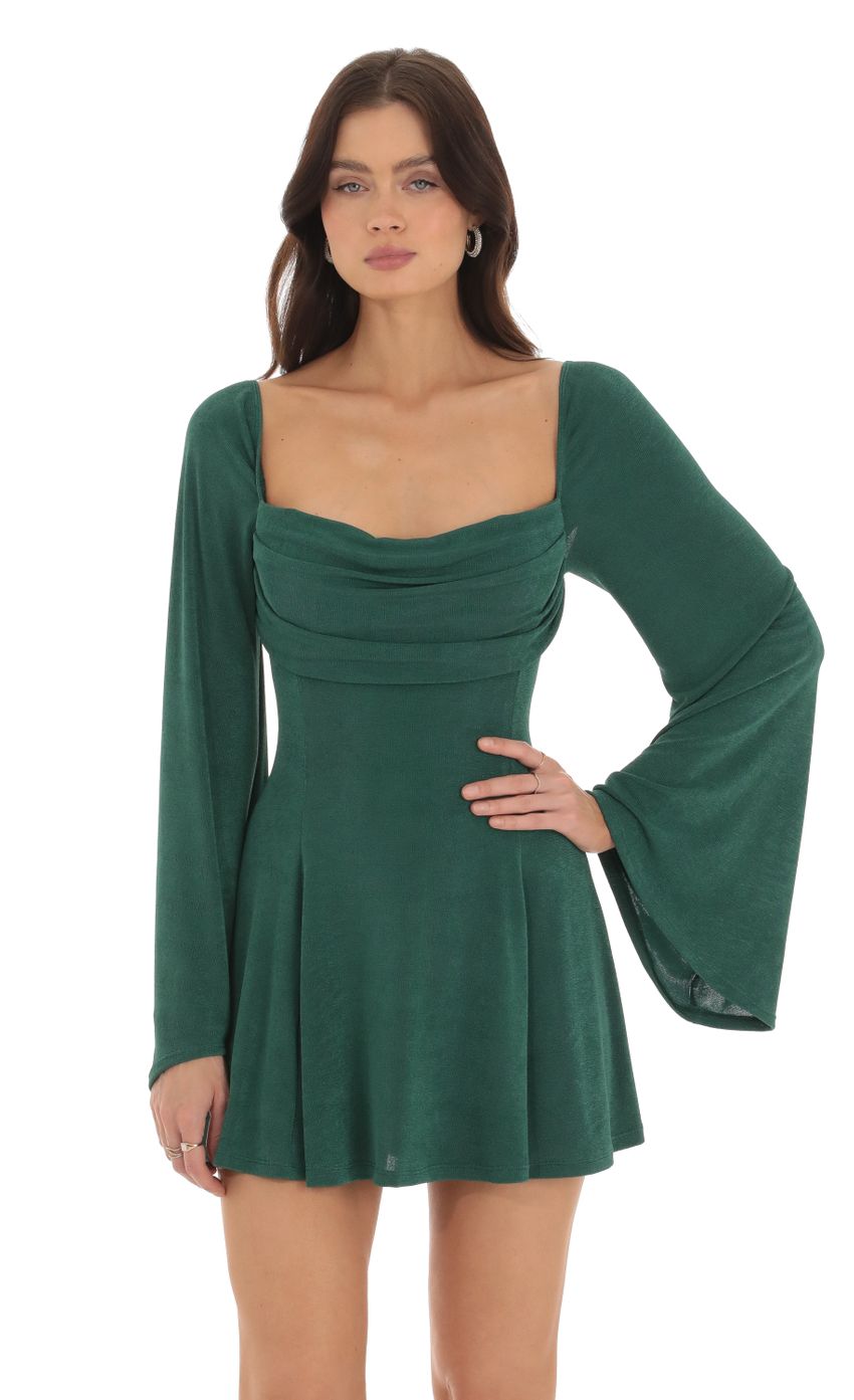 Picture Sirena Slinky Flare Sleeve Dress in Green. Source: https://media.lucyinthesky.com/data/Oct23/850xAUTO/3c504b47-9181-4567-acc8-a5e9e22a73a5.jpg