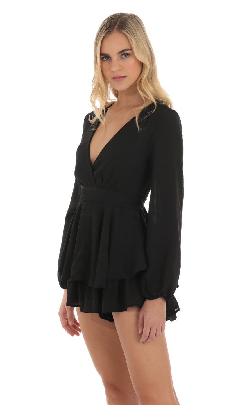 Picture Long Sleeve Wrap Romper in Black. Source: https://media.lucyinthesky.com/data/Oct23/850xAUTO/53ff7830-3d41-478d-9025-3c2ced41ca34.jpg