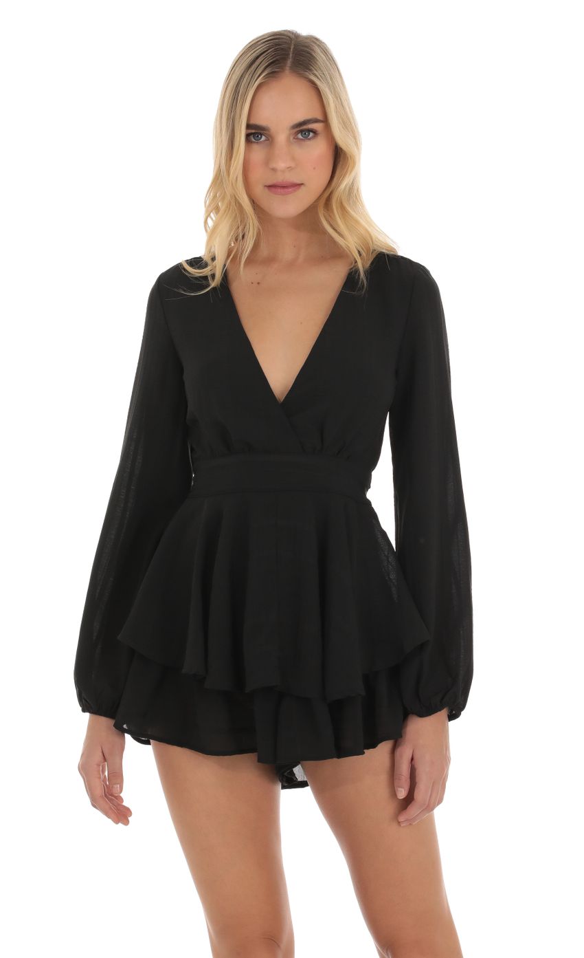 Picture Long Sleeve Wrap Romper in Black. Source: https://media.lucyinthesky.com/data/Oct23/850xAUTO/837d4192-0960-4721-bf0a-706f49f90338.jpg
