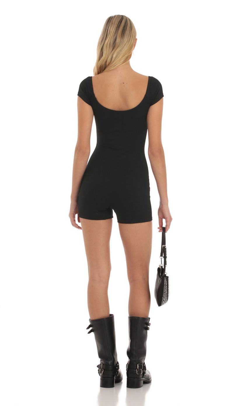 Picture Aleena Ribbed Bodycon Romper in Black. Source: https://media.lucyinthesky.com/data/Oct23/850xAUTO/ad76badb-3aae-47bf-ab15-2f30d32941bd.jpg